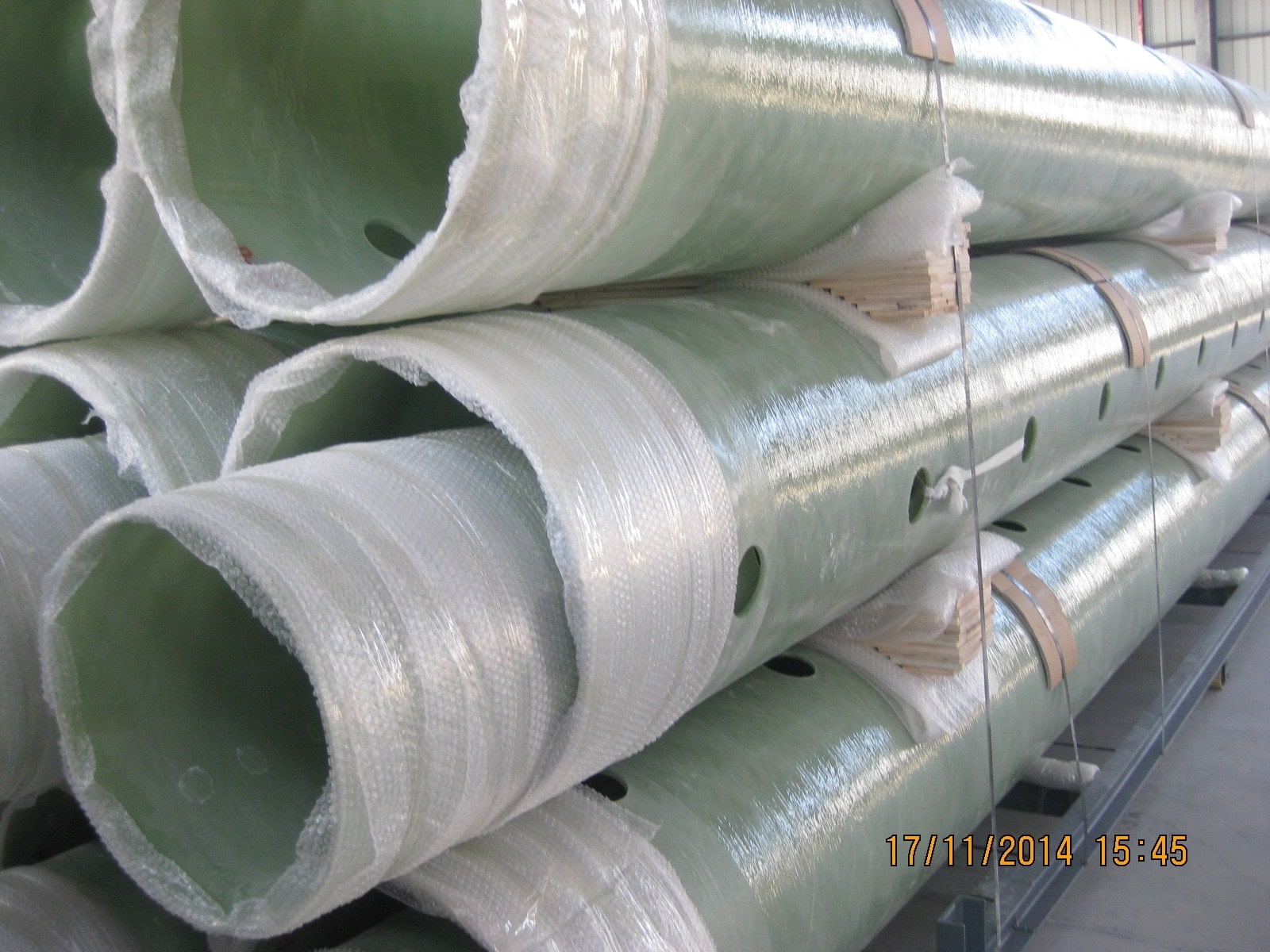 FRP straight pipe surface detail showing fiberglass reinforced plastic laminate structure and inner lining