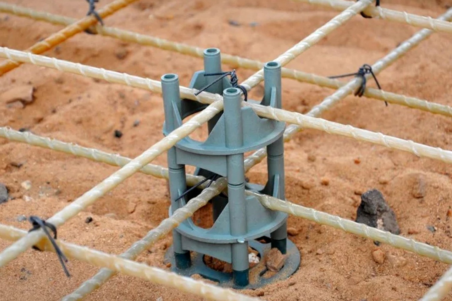 FRP grating clip and hold-down hardware in industrial installation context