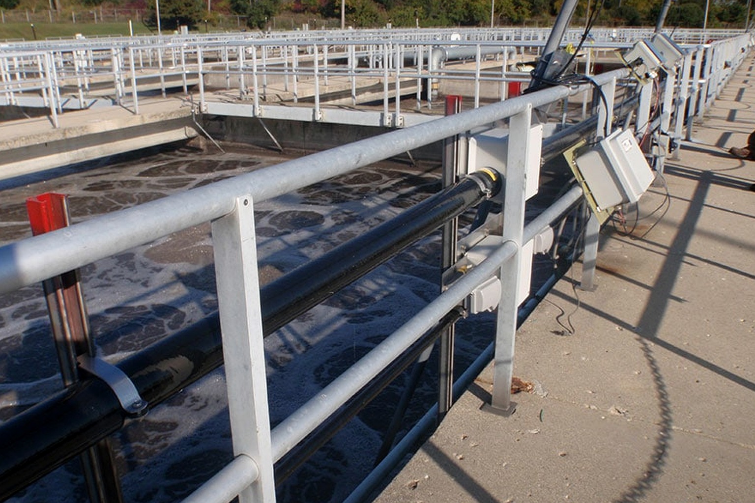 FRP handrail and railing component installation in an industrial walkway